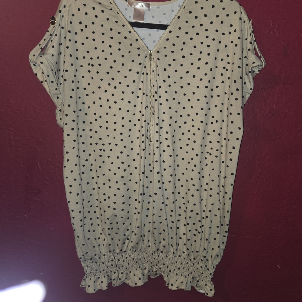 Polka Dot Blouse with Ruffle Hem